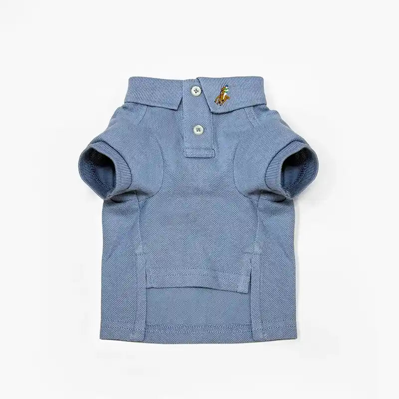 Ralph Lauren dog polo shirt in light blue with short sleeves, two-button placket, and player logo.