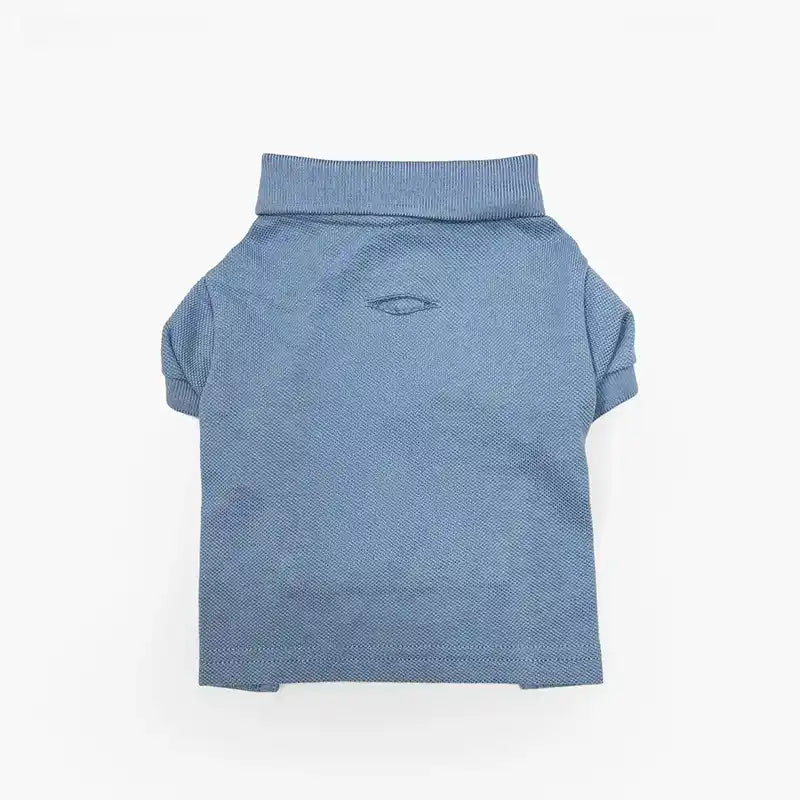 Back of a light blue dog polo shirt with short sleeves and a folded collar.