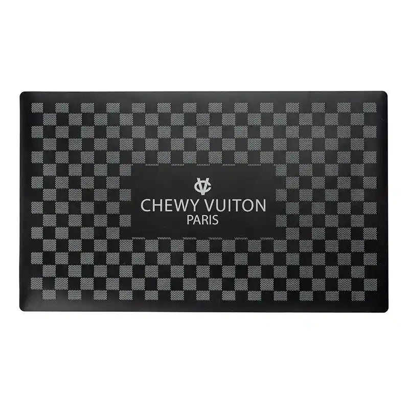 Black checkered pet placemat with 'Chewy Vuiton Paris' branding