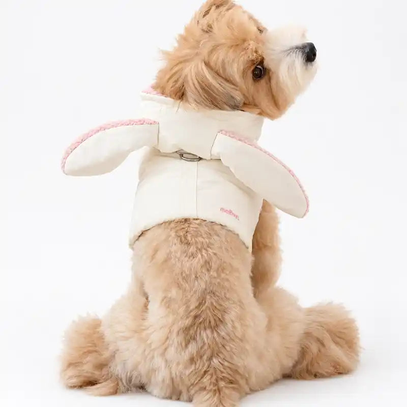 Bunny dog harness in ivory puffer fabric with floppy bunny ears and pink trim, rear view