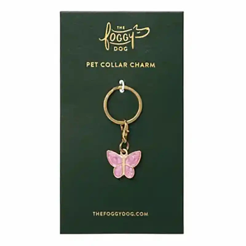 Butterfly pet collar charm on a green card with 'The Foggy Dog' branding.