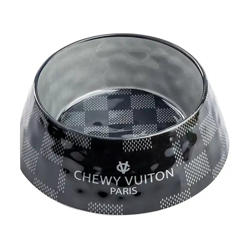 Black pet bowl with 'Chewy Vuiton Paris' branding on a white background