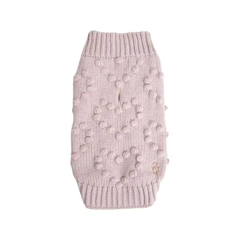 back side of pink knitted dog sweater adorned with bobbles shaped in hearts