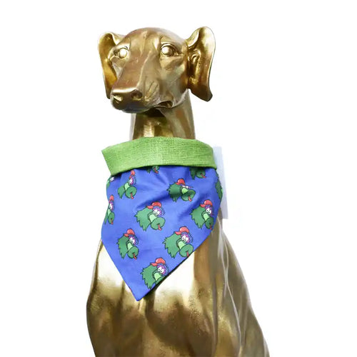 Gold Iggy Statue wearing a Philly Phanatics Bandana on a blue background