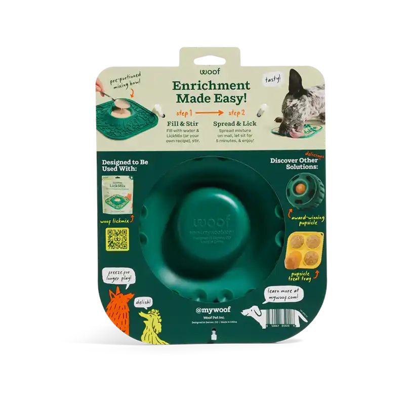 Green dog lickmat with back of packaging labeled 'Enrichment Made Easy' on a white background