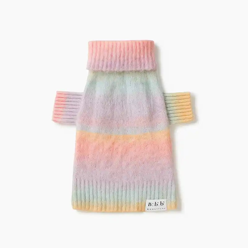 Pastel striped ombre dog sweater on a white background