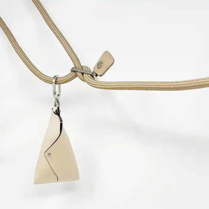 Hozi Poo Bag carrier connected to leash