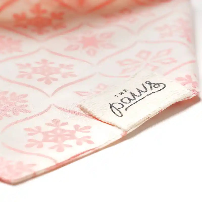 dog bandana with pink snowflakes closeup
