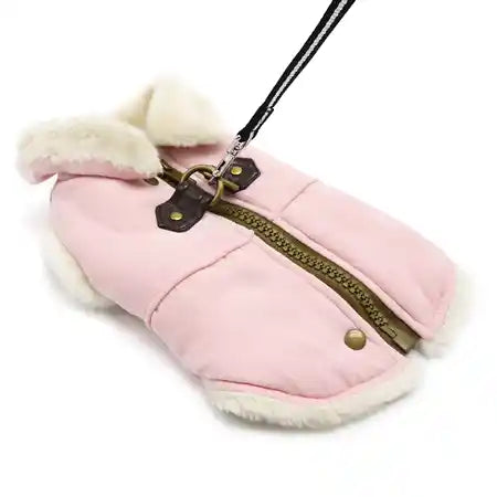 pink furry runner dog coat with built in harness attached to leash