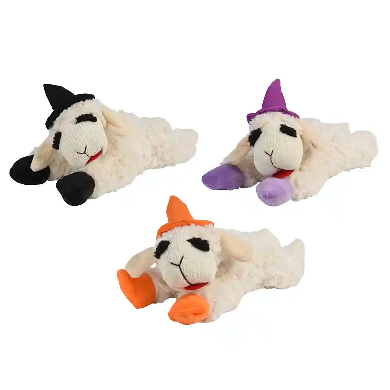 Three Lamb Chop dog toys wearing black, purple, and orange witch hats.