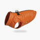 Pumpkin puffer vest for dogs on a white background.