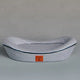 Navy and white striped pet bed with brand label on a grey background