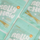 Light blue packages of "Rolly Chew Goat Milk" arranged next to each other.