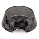 Black pet bowl with checkered pattern on a white background