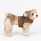 Side view of a brown puffer dog harness with a fleece-lined bear-ear hood.