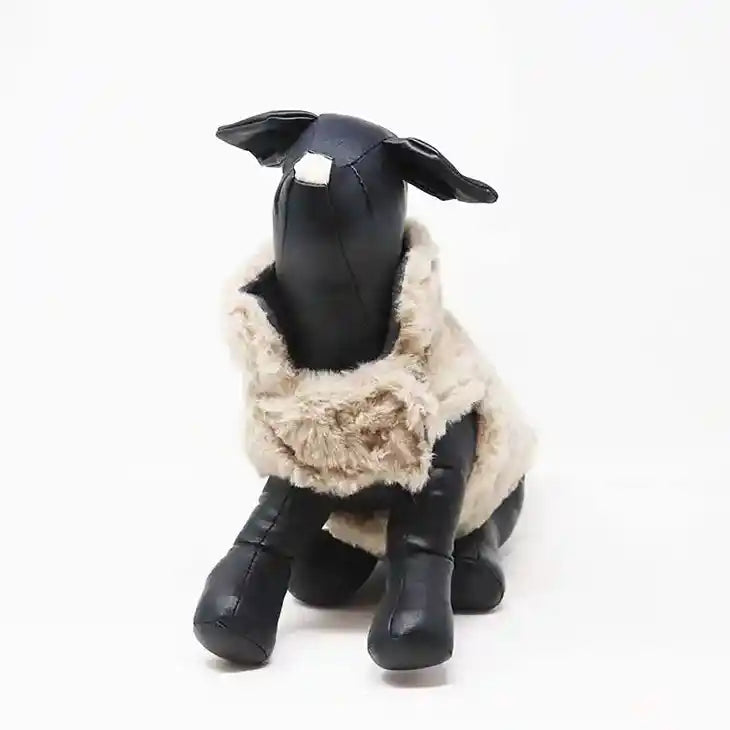 beige faux fur coat on dog mannequin