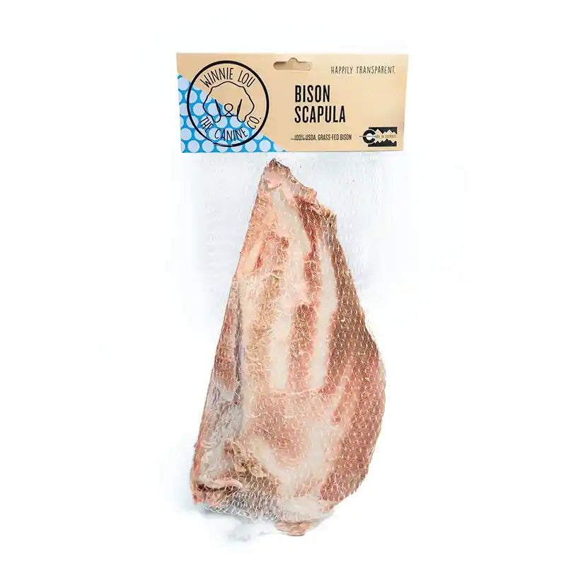 Bison scapula on a white background with a branded packaging label.