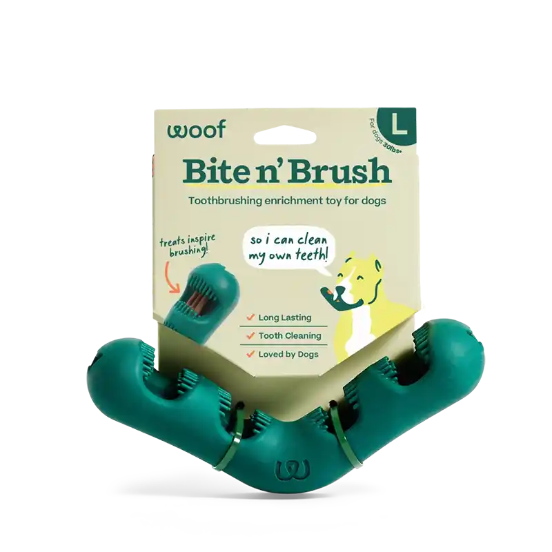 L Bite n' Brush' toothbrushing enrichment toy for dogs with packaging on a white background