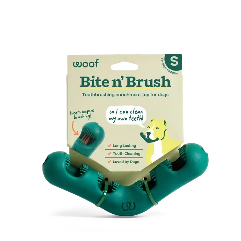 S Bite n' Brush' toothbrushing enrichment toy for dogs with packaging on a white background