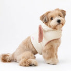 Ivory bunny dog harness with pink fleece lining and raised collar, shown from the side