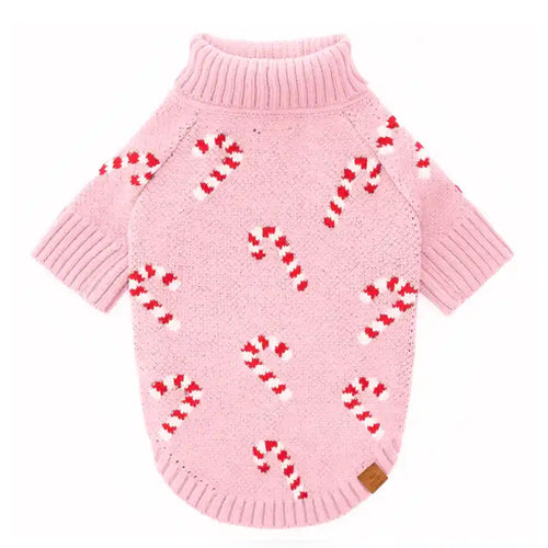 Pink knitted dog sweater with a candycane repeat design