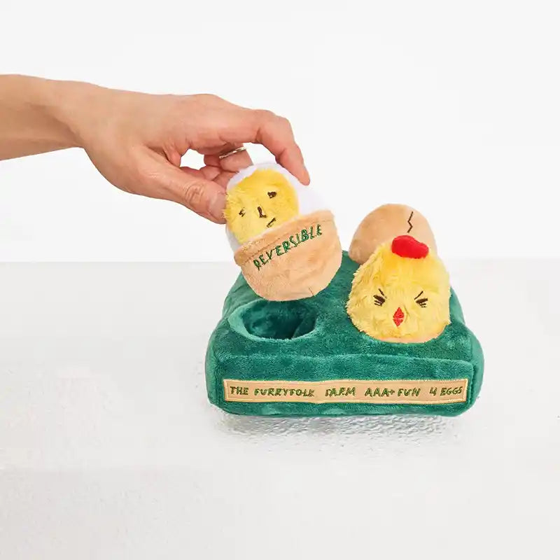 eggs nosework dog toy with one egg lifted