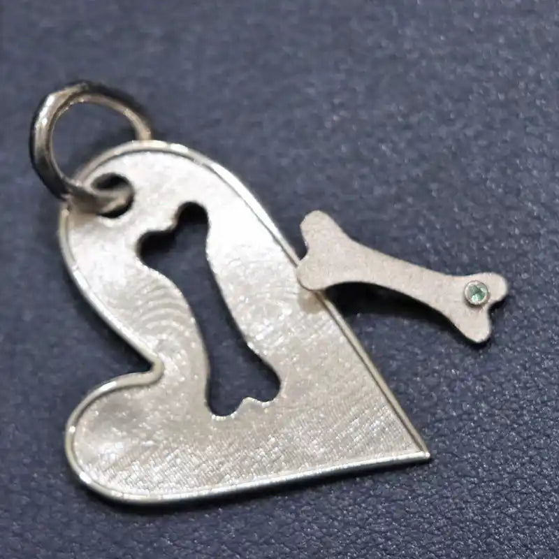 heart and bone whisker link in sterling silver