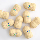 lots of squeaky peanut dog toys