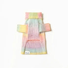 underside of Pastel striped ombre dog sweater on a white background