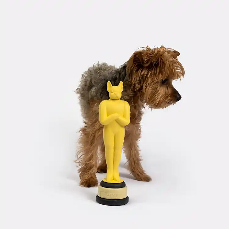 oscar dog toy with a frenchie head modeled with dog