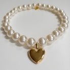 Faux Pearl dog/cat necklace with a gold heart-shaped charm 