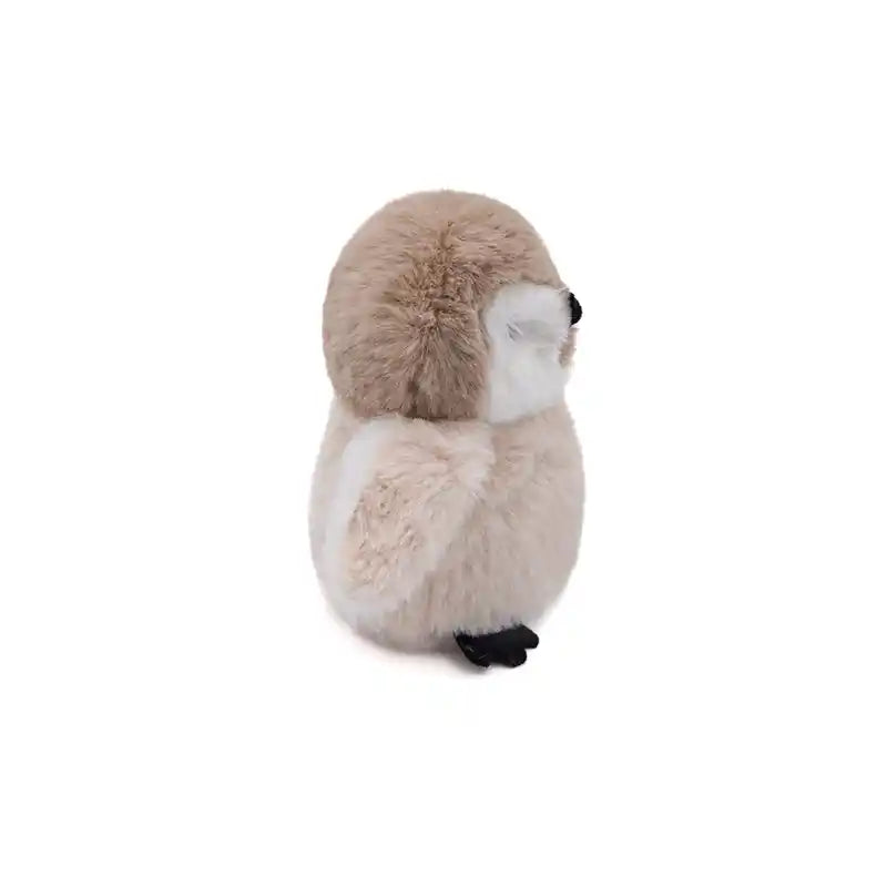 Side view of Plush toy penguin on a white background