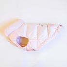 side view of pink dog puffer jacket