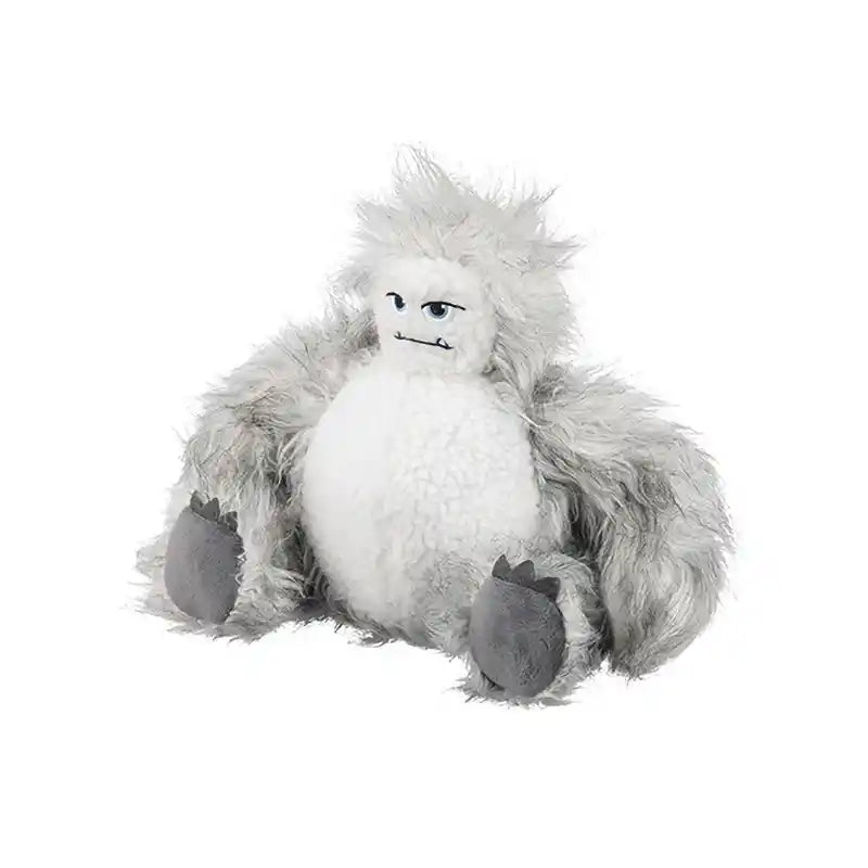 Plush yeti plush dog toy sitting upright on a white background.