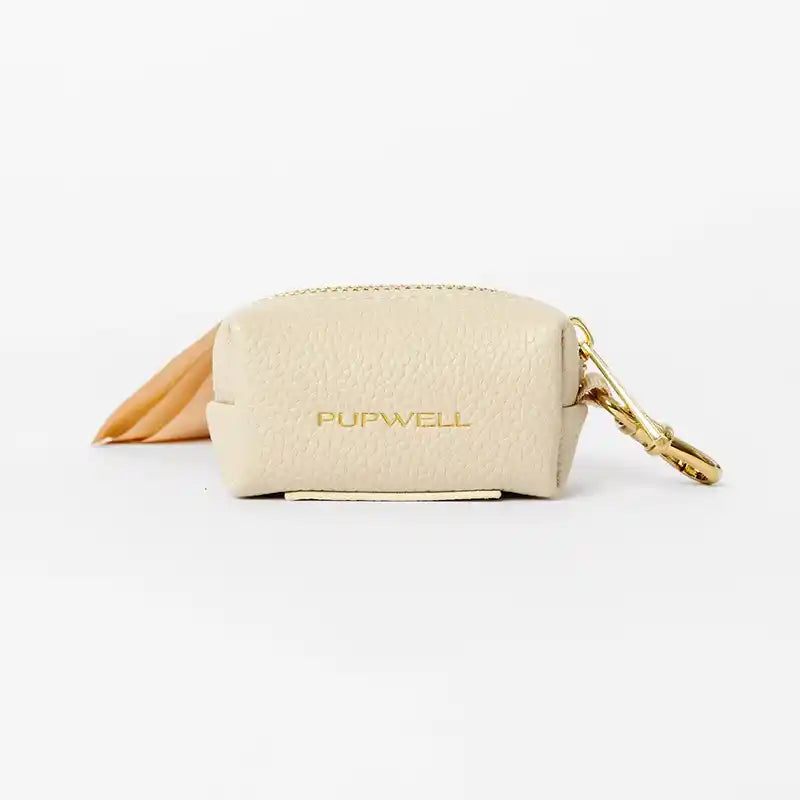 Beige poo bag pouch with gold zipper and 'PUPWELL' branding on a white background