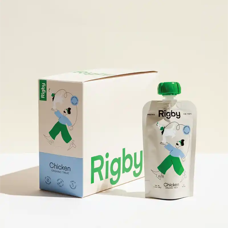 Rigby Chicken packaging including a box and a pouch on a light beige background