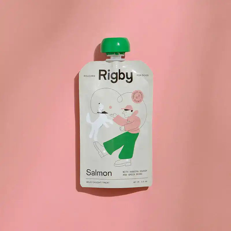 Rigby salmon pouch for dogs on a pink background