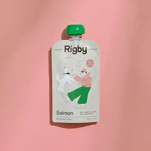 Rigby salmon pouch for dogs on a pink background