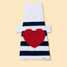 Striped navy and white with a large red heart on back dog sweater