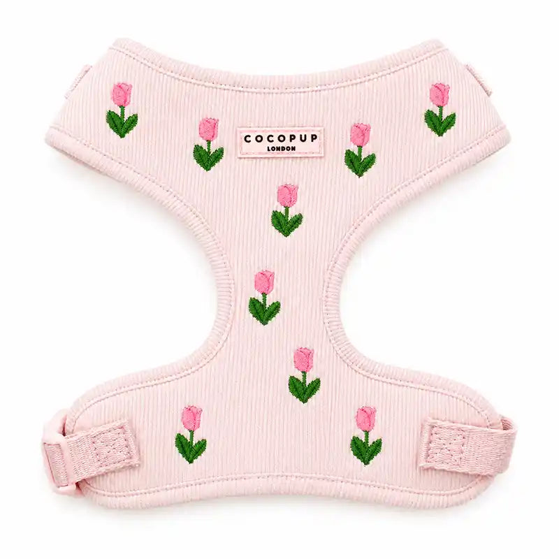 Pink dog harness with pink embroidered tulips on a white background
