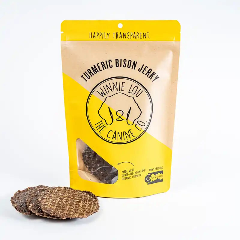 Turmeric bison jerky package with yellow and beige design on a white background