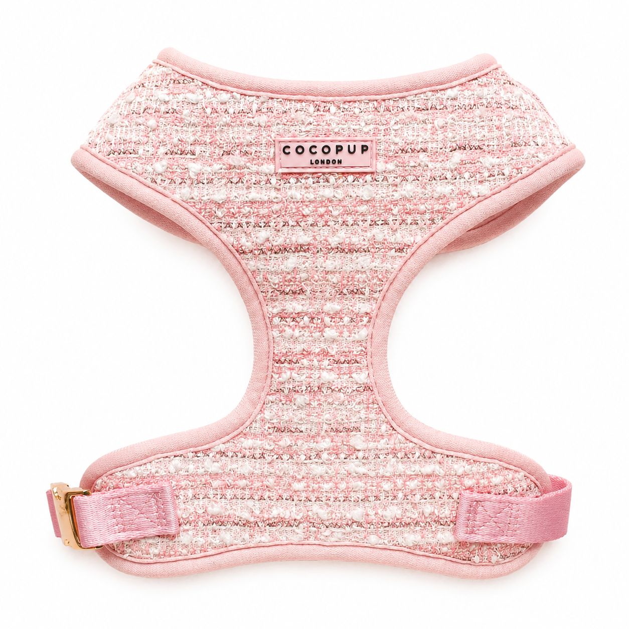 Pink tweed dog harness with 'CocoPup London' branding on a white background