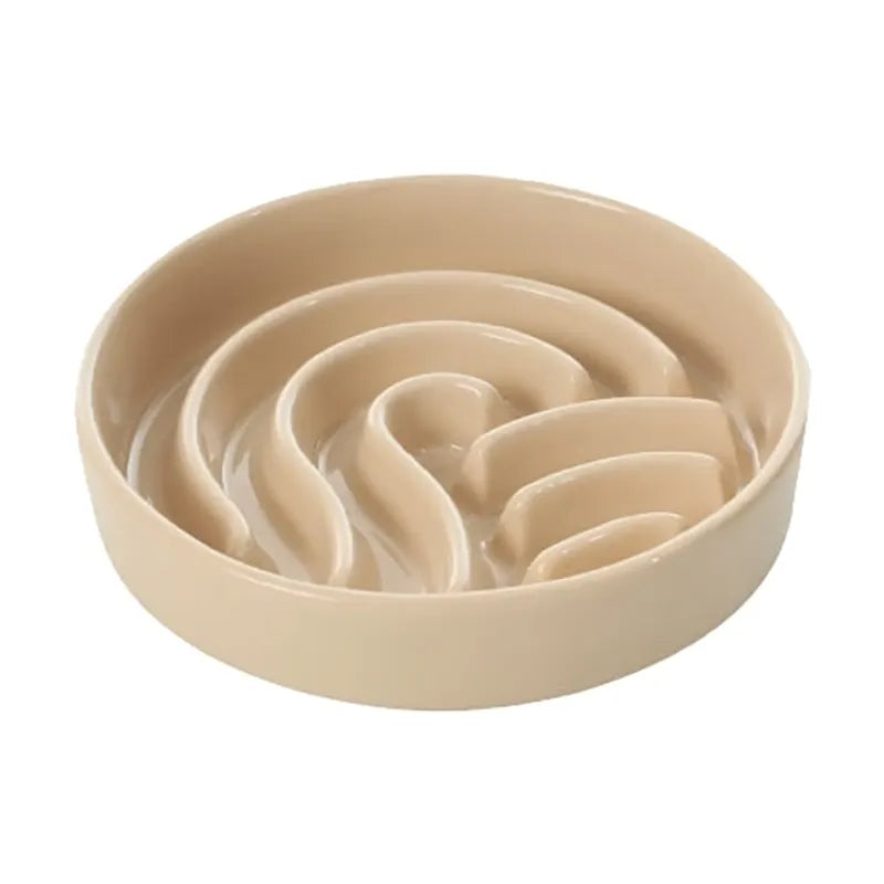 beige ceramic slow feeder with wave pattern