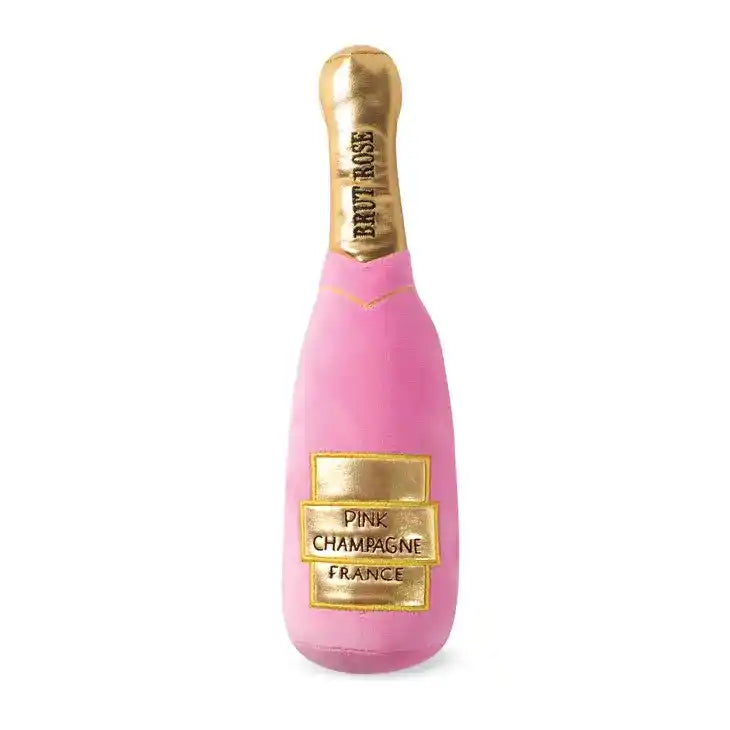 pink champagne plush dog toy