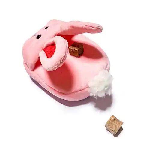 squeaky pink bunny slipper dog toy with treats