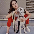 saint rue the city leash fur - tan and black with tan fur handle lining