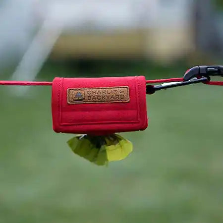 charlie's backyard red poobag pouch on leash